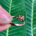 Woman wearing the cushion cut moissanite ring, shown as a delicate anniversary gift