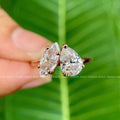 TrionzaDiamond wedding ring designed with a bold two stone marquise and pear layout