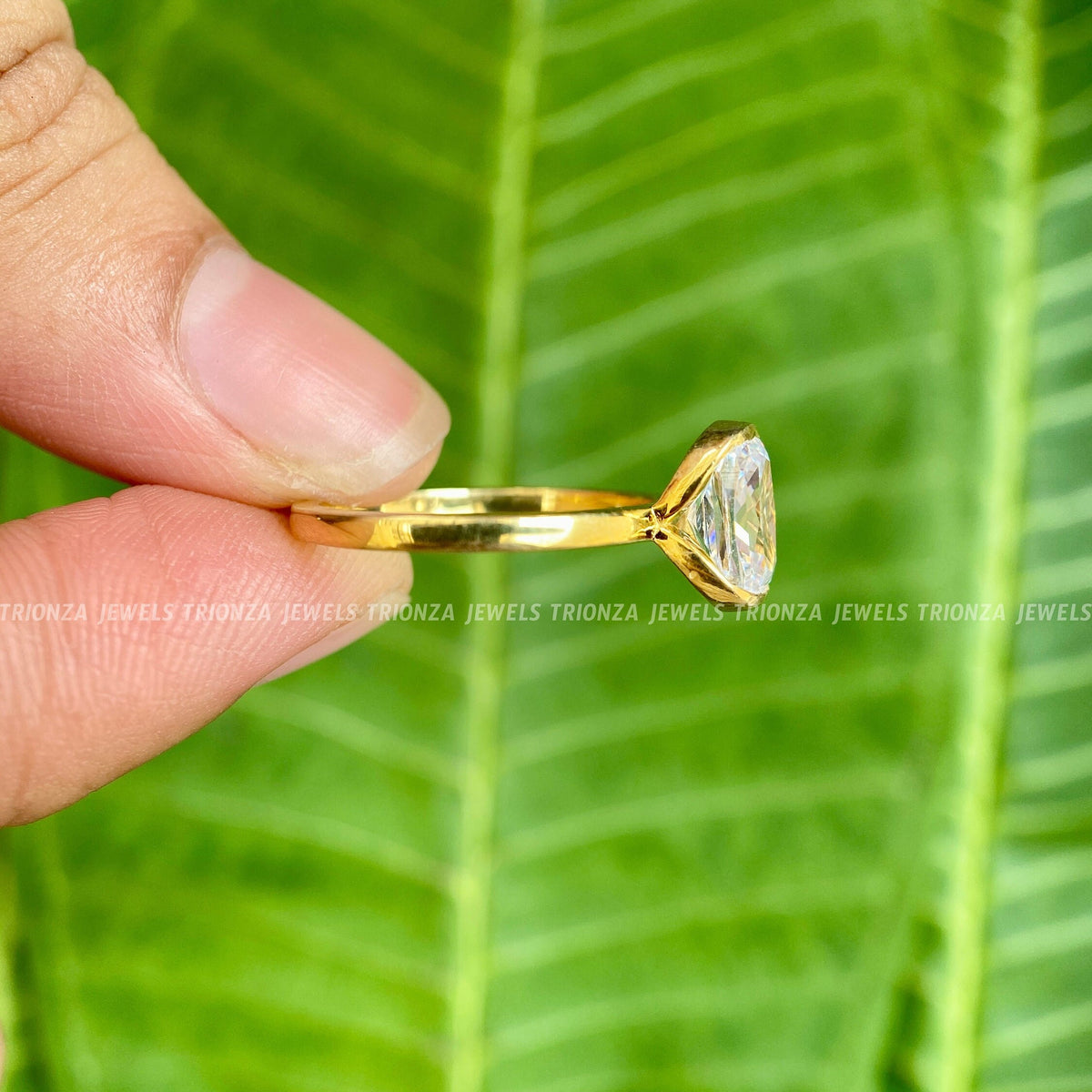 14K solid gold cushion cut moissanite ring shown in yellow, rose, and white gold finishes