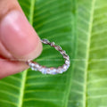Handmade 14K gold ring crafted with alternating moissanite stones for a delicate look