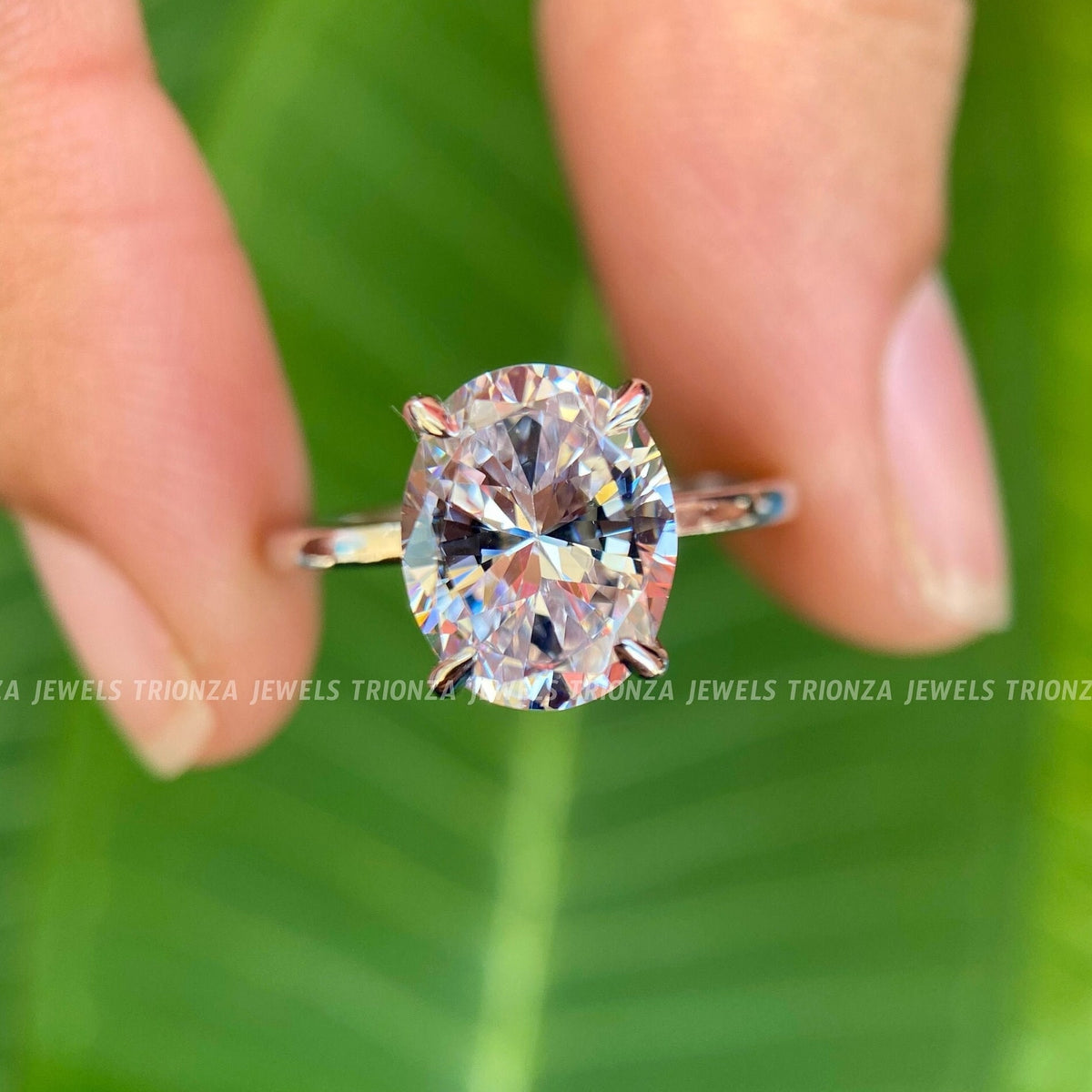 oval moissanite engagement ring