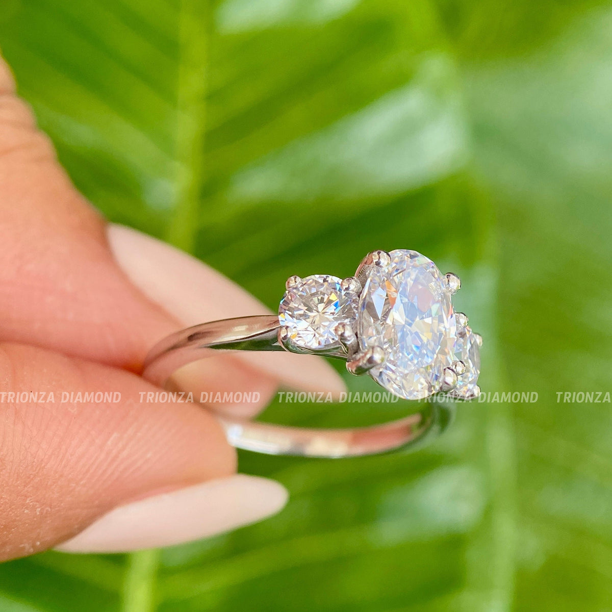Handmade moissanite engagement ring displayed inside its jewelry box with smooth fabric