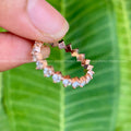 Handcrafted moissanite eternity ring presented in its jewelry box with smooth fabric