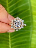 Handmade moissanite ring shown with its colorless VVS center stone and excellent cut grade