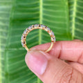 Woman wearing the oval diamond stackable band as an anniversary ring