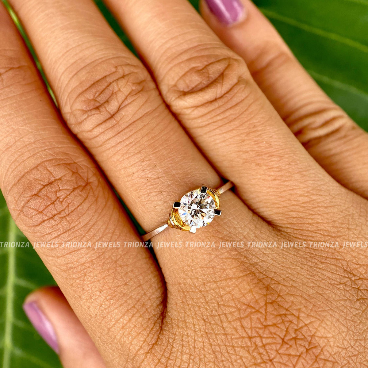 TrionzaDiamond engagement ring featuring a 1 CT round moissanite in a prong setting