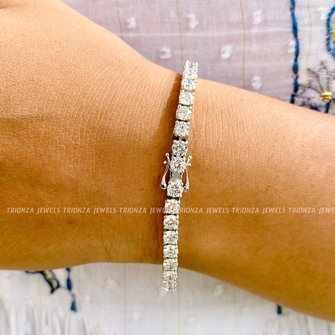 Round cut cubic zirconia tennis bracelet crafted in 925 sterling silver for daily wear