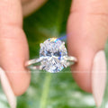 Oval cut moissanite engagement ring featuring a brilliant 3 CT colorless center stone