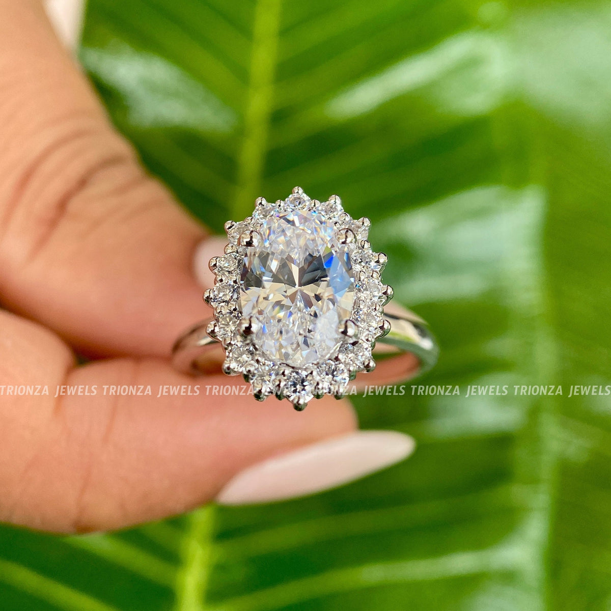 Side view of the oval halo ring highlighting the excellent cut, polish, and symmetry