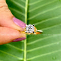 Solitaire ring for her presented in a jewelry box with a smooth cleaning fabric