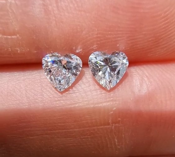 Heart shape lab grown diamond displayed to showcase its D color and VS1 clarity