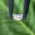 Loose diamond pair photographed from an angle to show depth and clarity