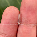 Close-up of the baguette diamond highlighting its precise cut and polished facets