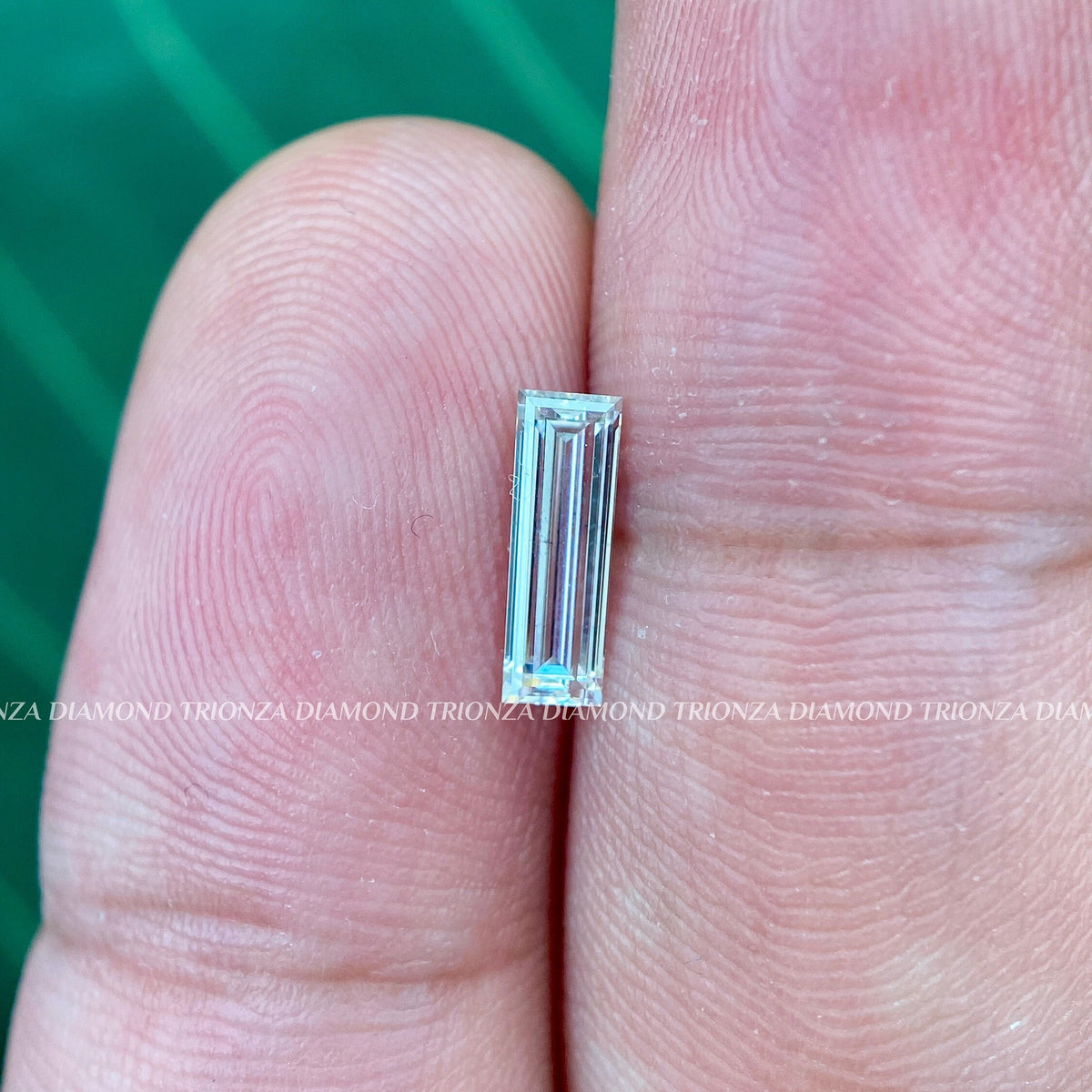 Lab created baguette diamond ready to be set into a handcrafted custom engagement ring