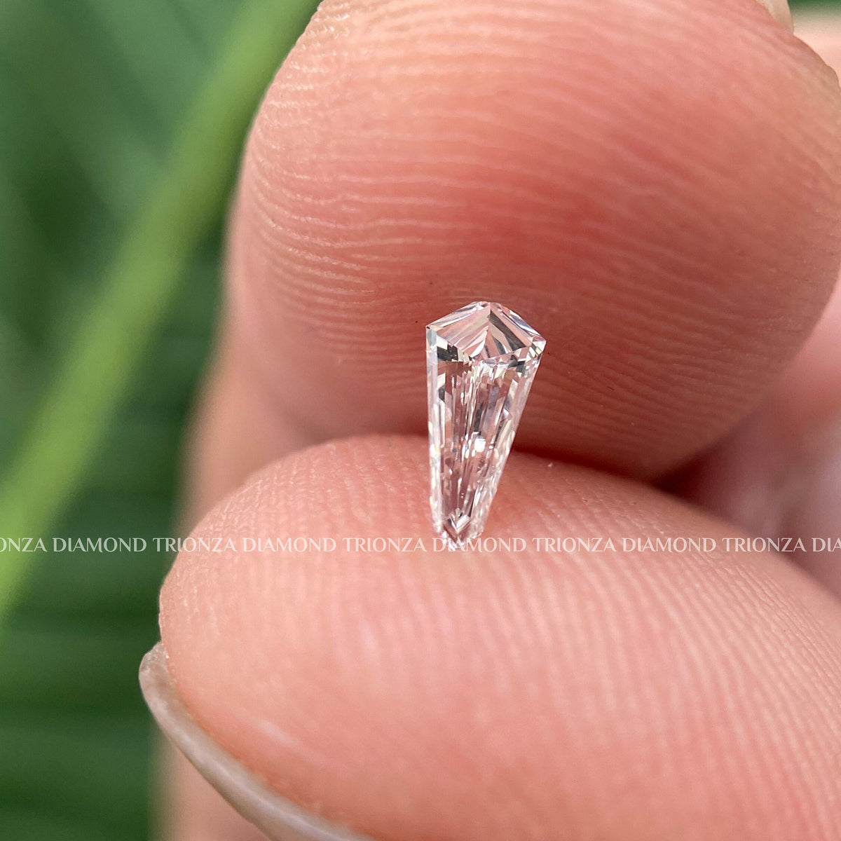 Lab grown shield diamond suited as a side stone for custom engagement ring designs