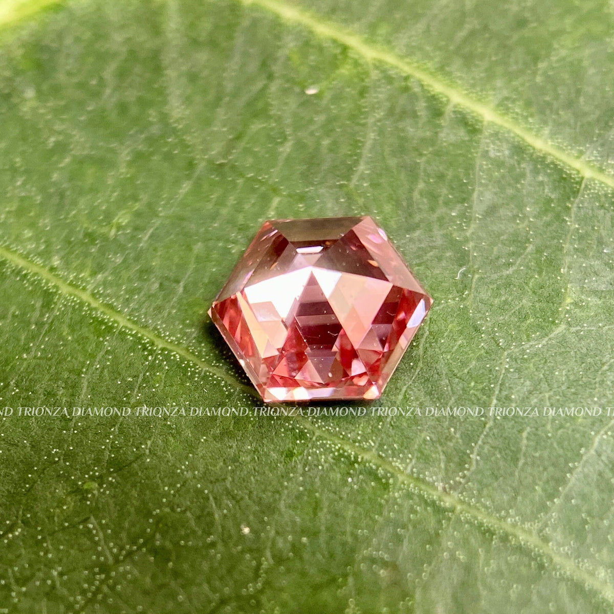 Vivid red hexagon diamond presented as a versatile gift for women and custom orders