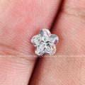 Floral shape brilliant cut lab grown diamond displayed to show its fancy cut detail