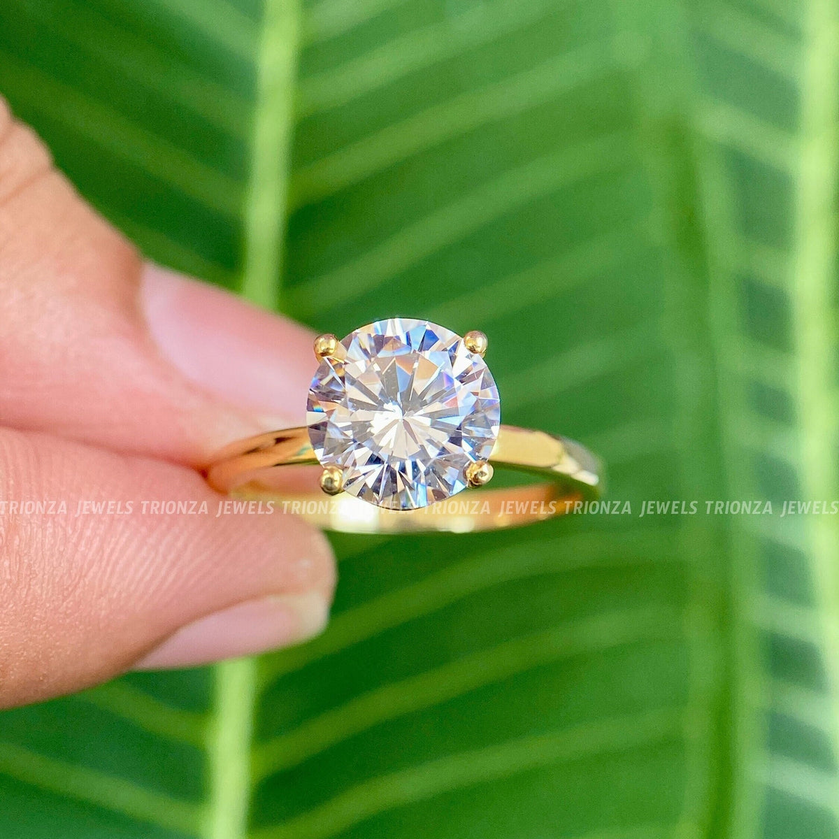 TrionzaDiamond gold promise ring designed with a handmade 4-prong solitaire setting