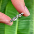 Art Deco half eternity wedding band featuring scalloped milgrain detail along the shank