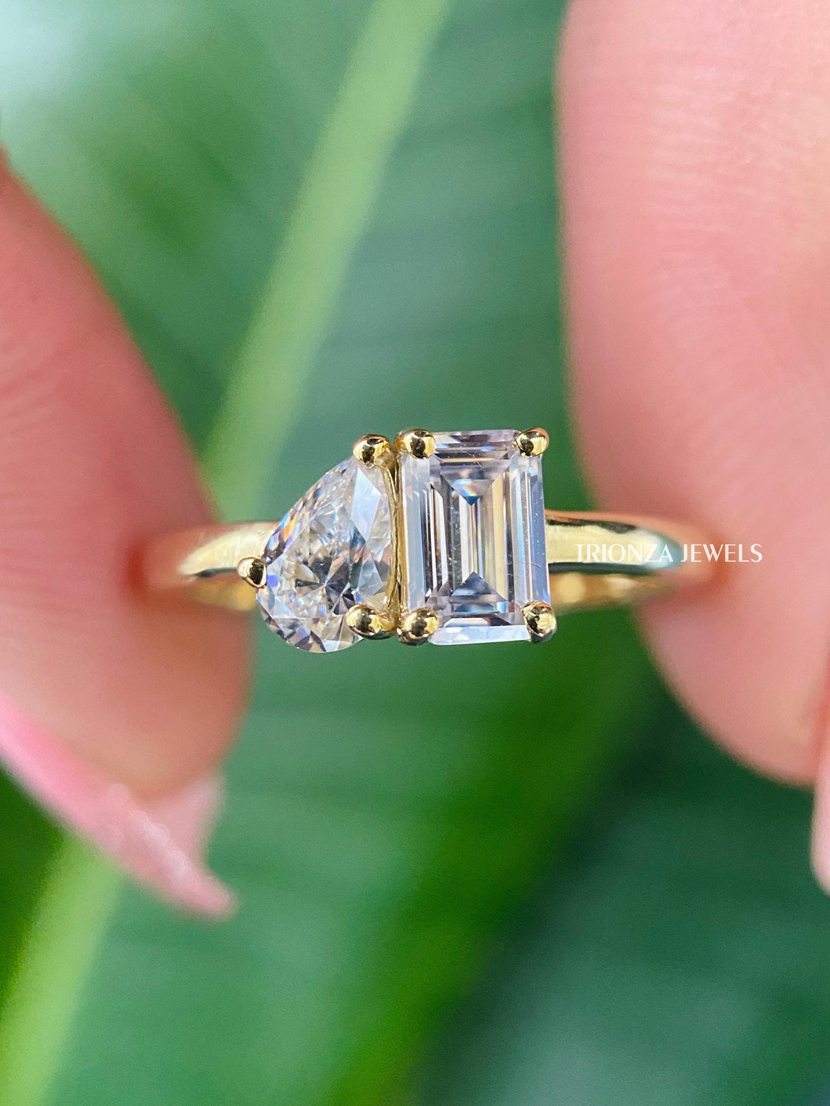 Pear and emerald cut moissanite Toi Et Moi engagement ring in 14k solid yellow gold shank