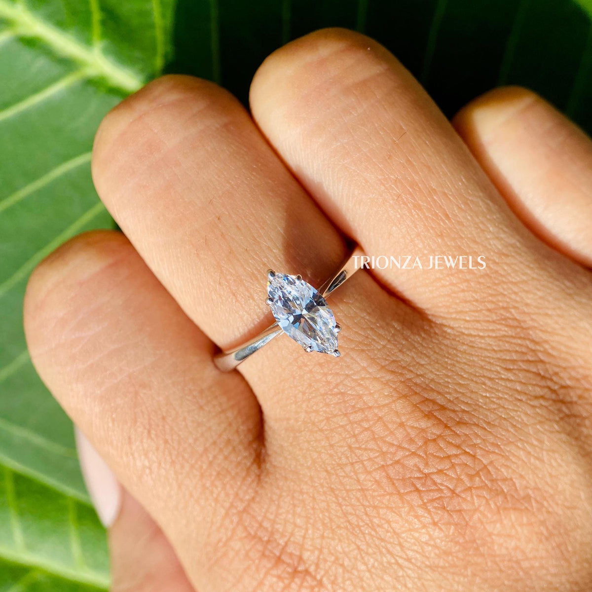 Handmade solitaire marquise wedding ring set in a prong or halo setting for lasting elegance