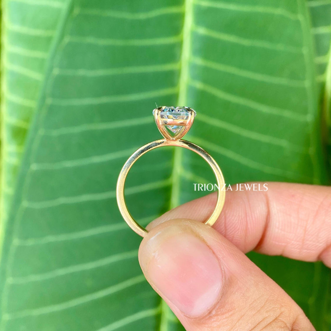 Oval cut moissanite engagement ring featuring a 5.0 CT elongated stone in a prong setting