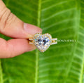 Heart cut moissanite ring displayed in a jewelry box with smooth fabric included