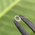 Oval rose step cut lab grown diamond displayed to showcase its fancy cut faceting