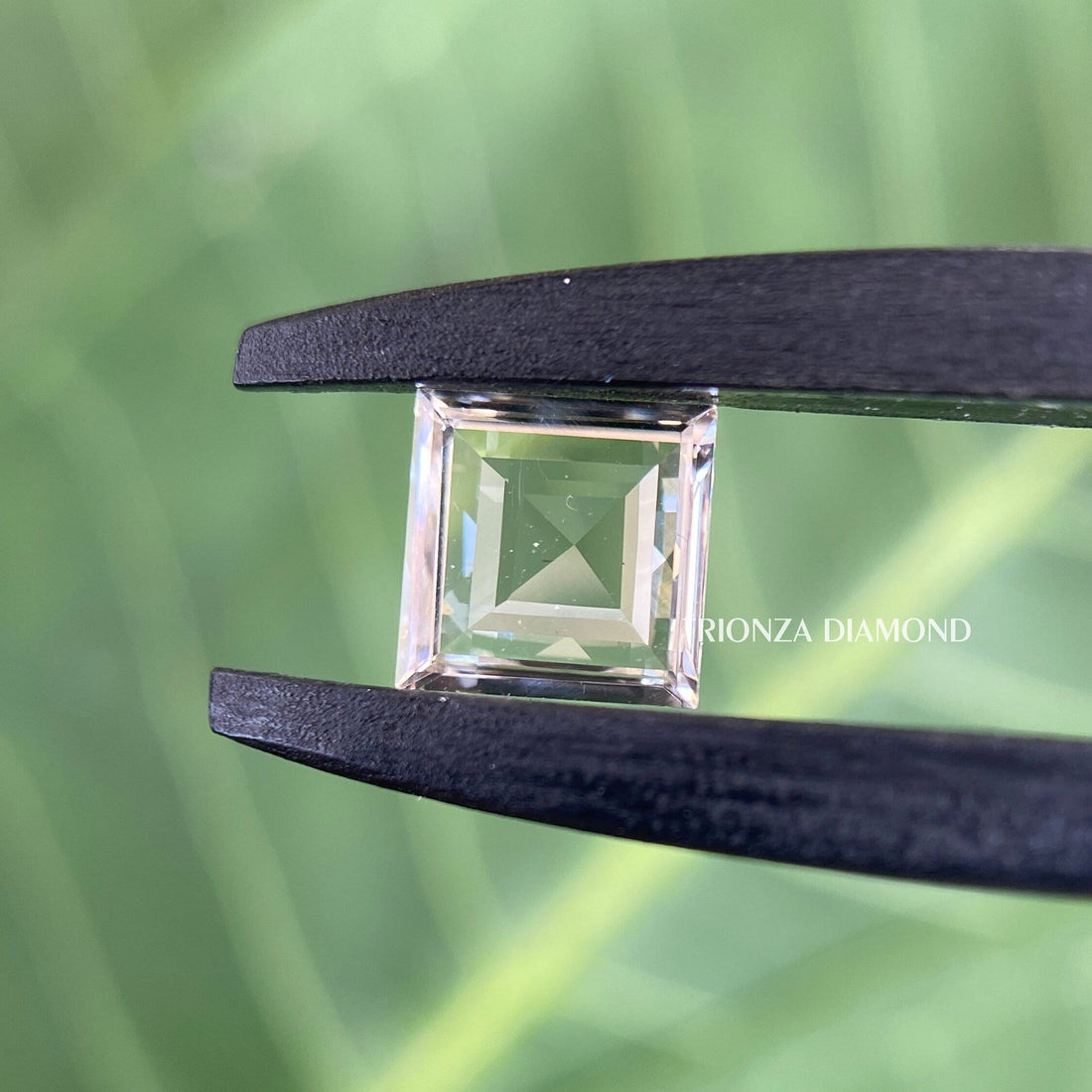 Princess rose cut lab grown diamond displayed to highlight its vintage flat cut faceting