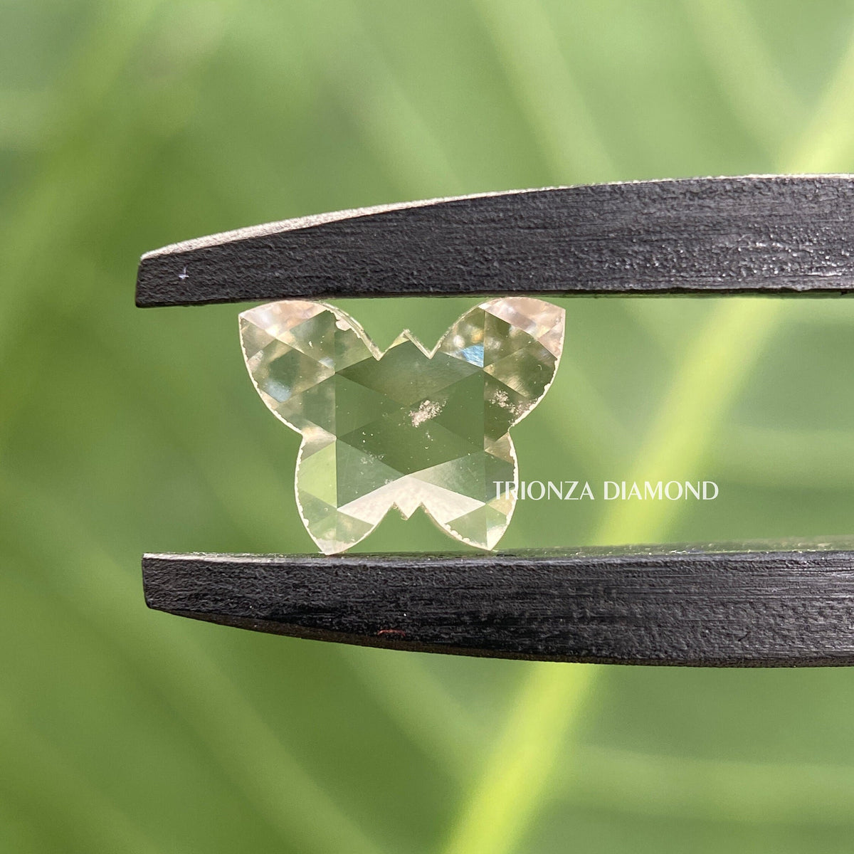 Butterfly shape diamond displayed loose, suited for vintage jewelry and custom pendant designs