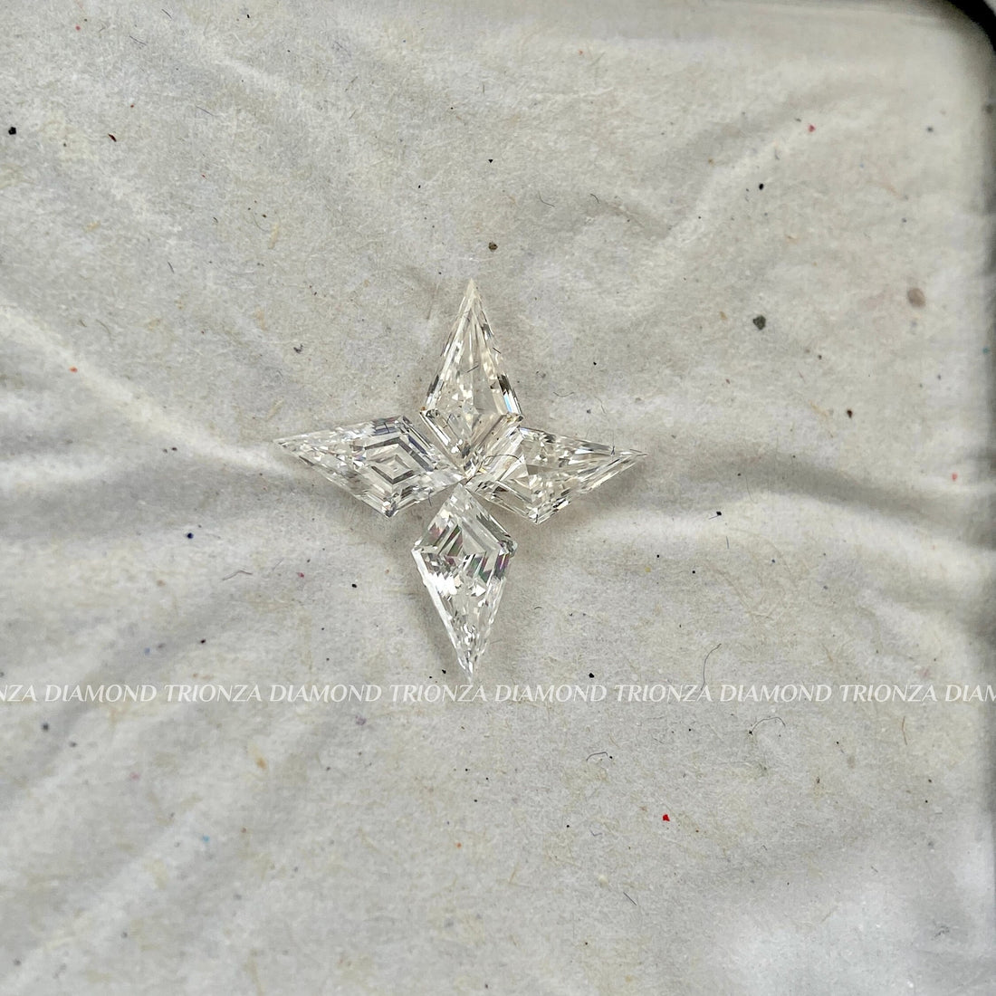 Kite cut lab grown diamonds arranged in a unique star shape for a custom pendant
