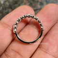 White gold half eternity band featuring DE/VS oval cut lab created diamonds