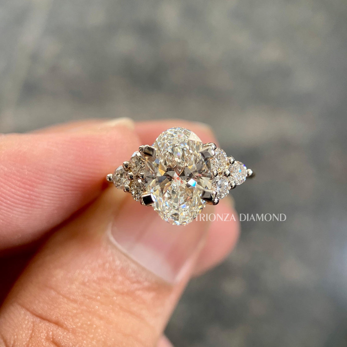 Side profile view of the conflict free lab grown diamond ring showing the polished band