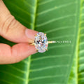 Handmade solitaire ring showcasing the 9mm x 11mm oval moissanite with excellent luster