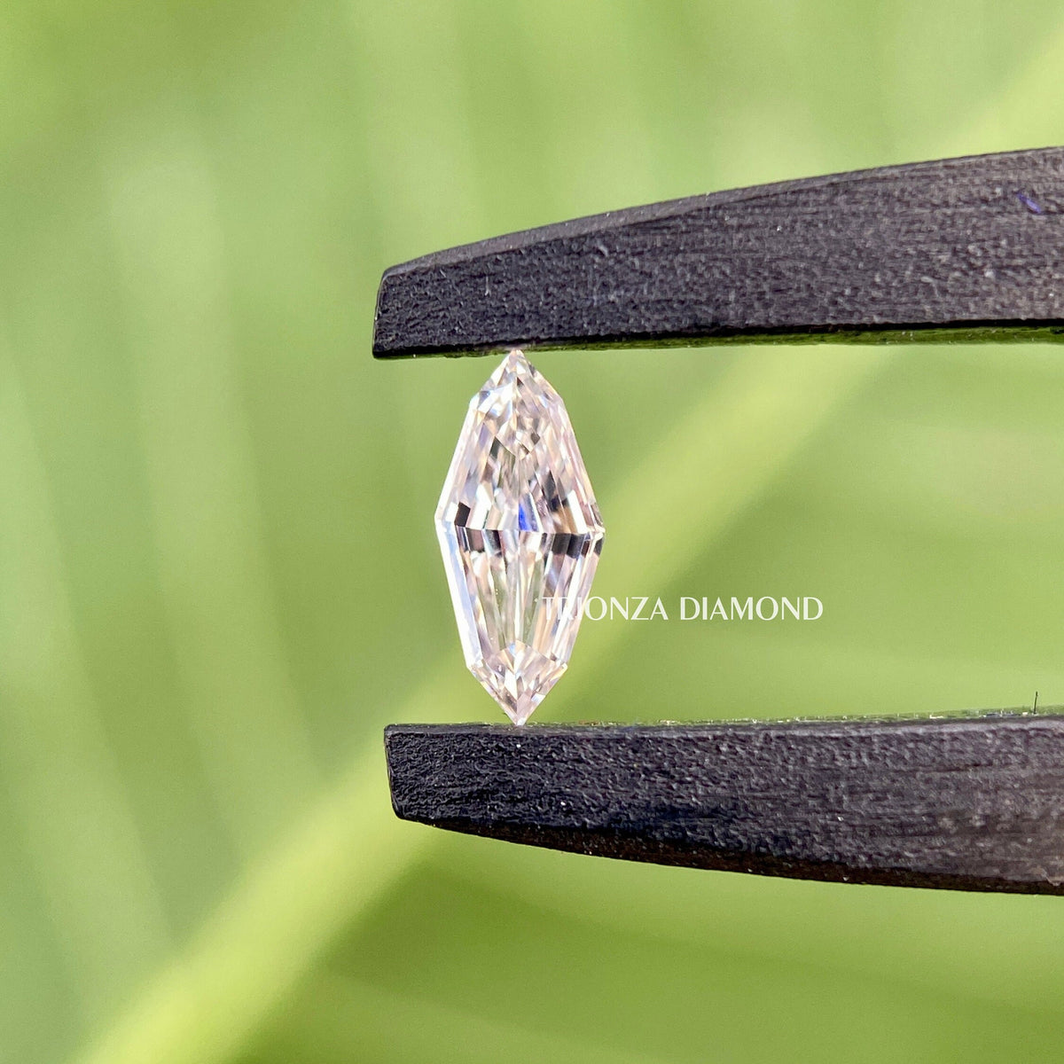 IGI certified 0.55 carat marquise diamond set against a soft background for detail viewing