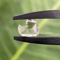 Close-up of the polished duck shape diamond highlighting its antique inspired cut