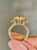 Woman wearing the diamond cluster ring showcasing its minimalist stacking style