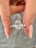 Woman wearing the oval diamond ring, highlighting its sparkle and modern bridal style