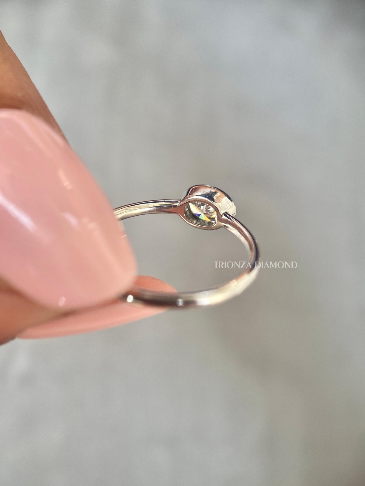 Oval diamond solitaire ring designed as an anniversary ring for women
