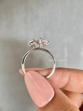 Unique two-stone proposal ring designed with E color and VS1 clarity diamonds