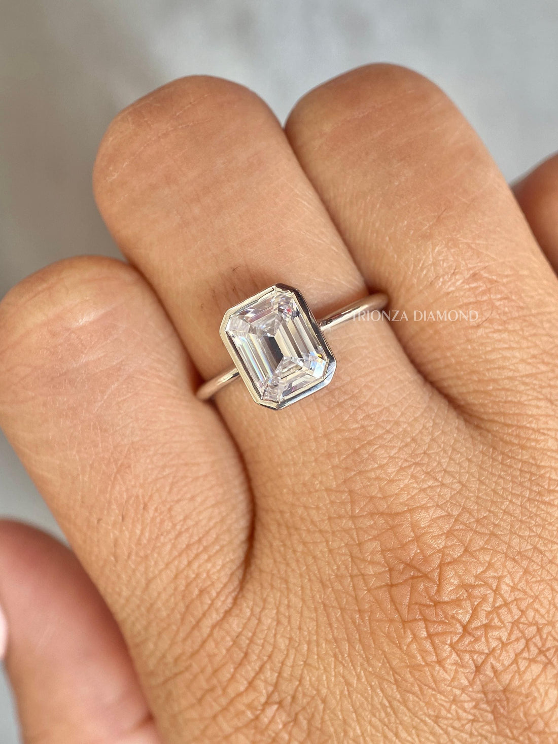 2 CT Emerald Cut Lab Diamond Ring | IGI D/VVS2 Bezel Solitaire