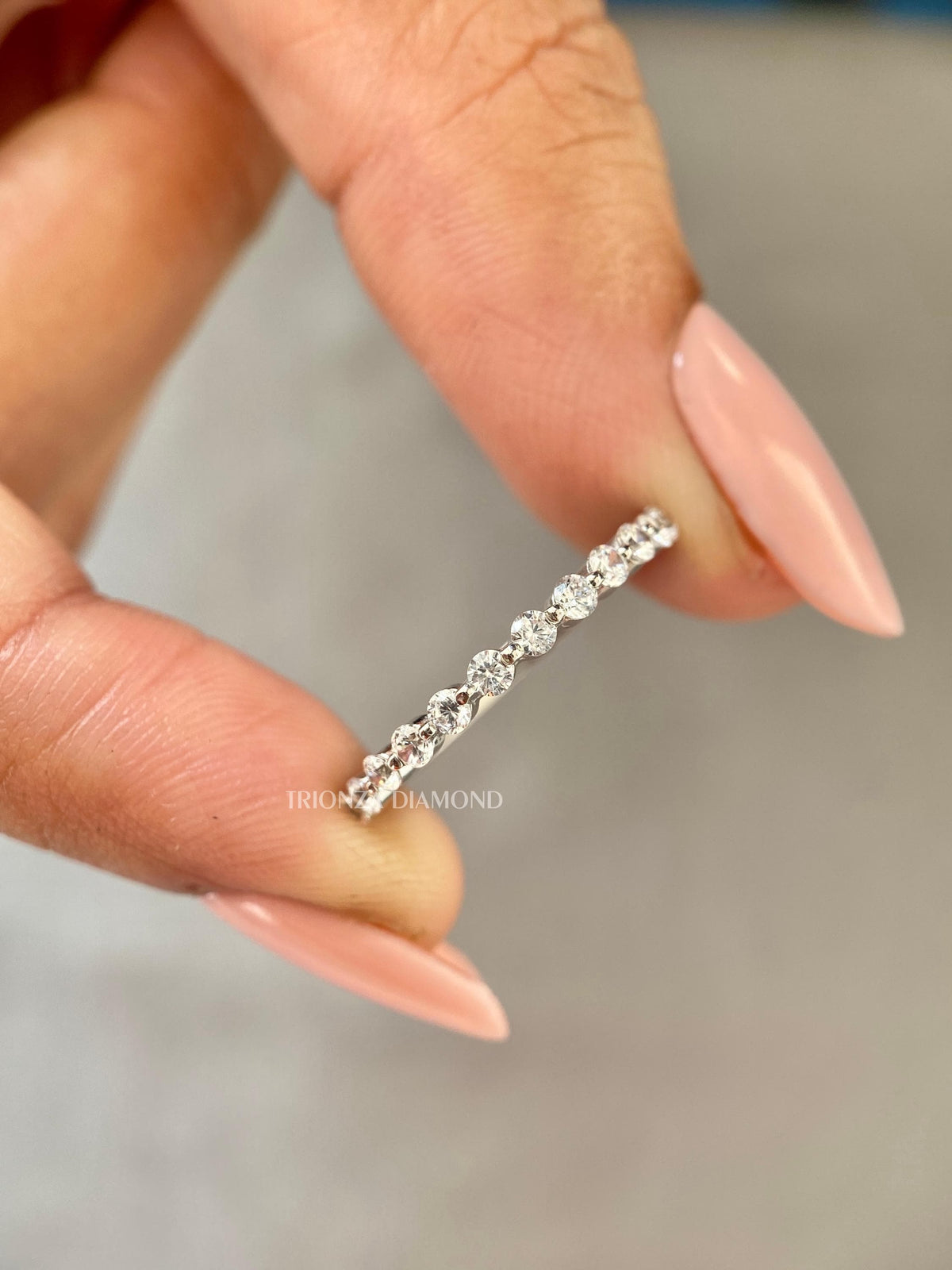 TrionzaDiamond wedding band handcrafted with round cut lab grown diamonds for everyday wear