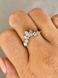 Marquise cut man made diamond band shown from an angle highlighting its eco friendly craftsmanship