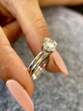 Close-up of the D/VVS2 lab grown diamonds set in a 14K gold band