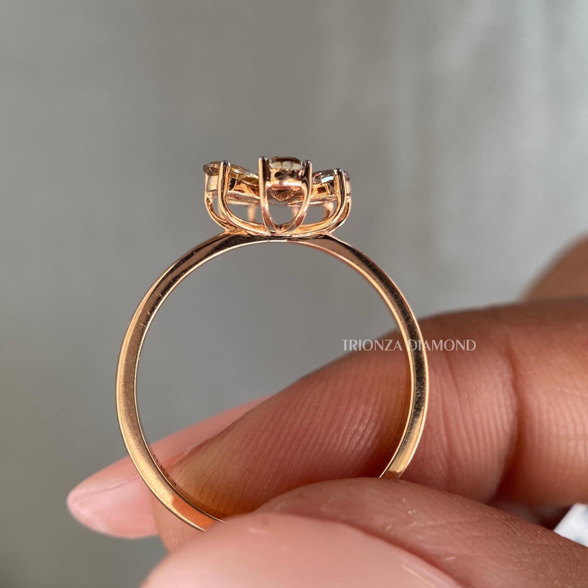 Handcrafted flower ring featuring genuine mined diamond and durable 14K gold band