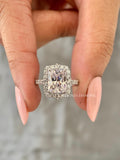 Radiant cut man made diamond ring shown from an angle highlighting the band thickness and width