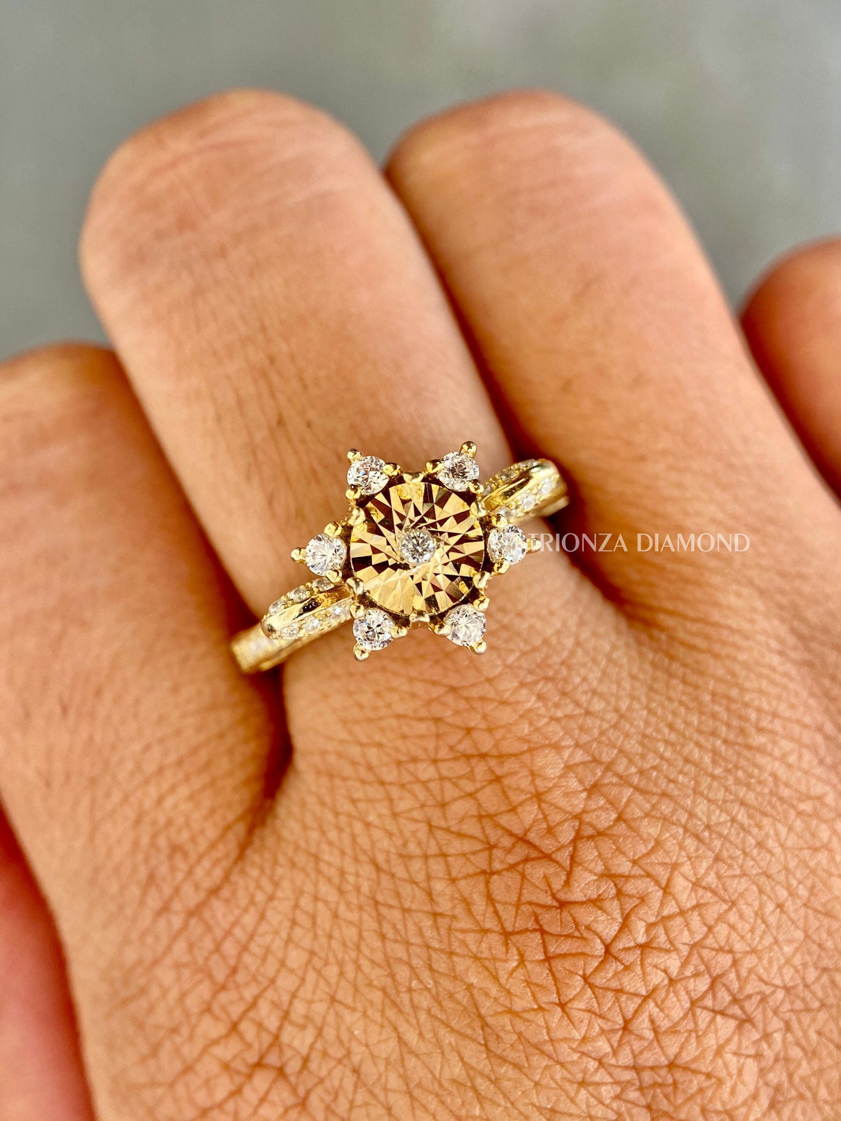 Close-up of the round brilliant cut lab grown diamonds set in the cluster ring