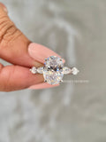 Close-up of the F/VVS2 certified oval diamond set in a sleek solitaire design
