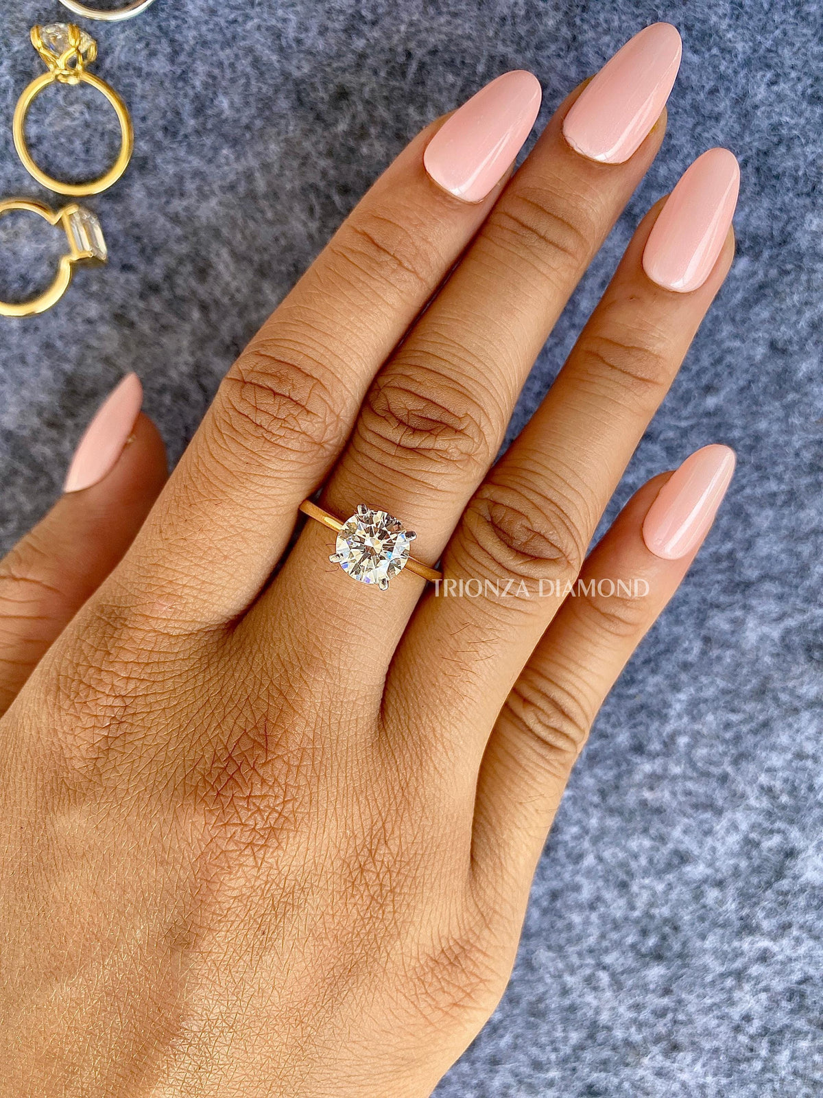 TrionzaDiamond solitaire ring crafted with an E color VVS2 clarity lab grown diamond