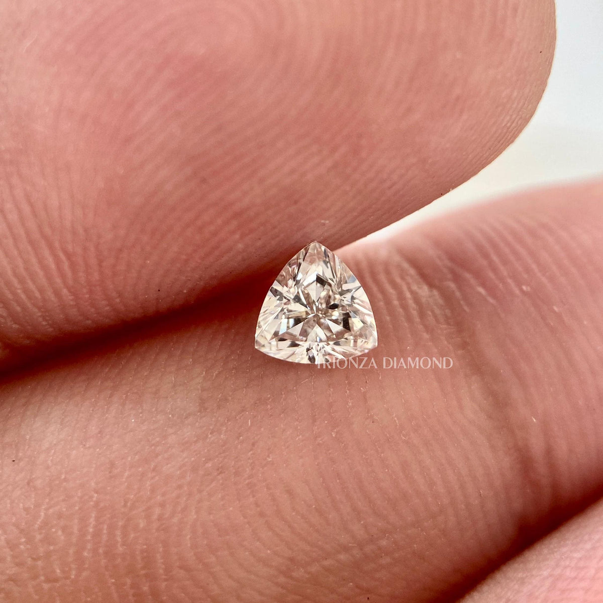 TrionzaDiamond trillion cut diamond pair suited for earrings or engagement ring side stones